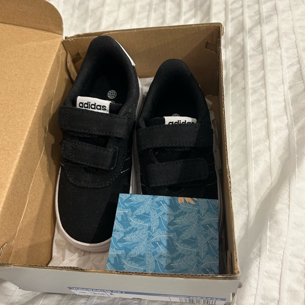 Adidas size 9 - little kids black runners

Brand new in box. Never worn
